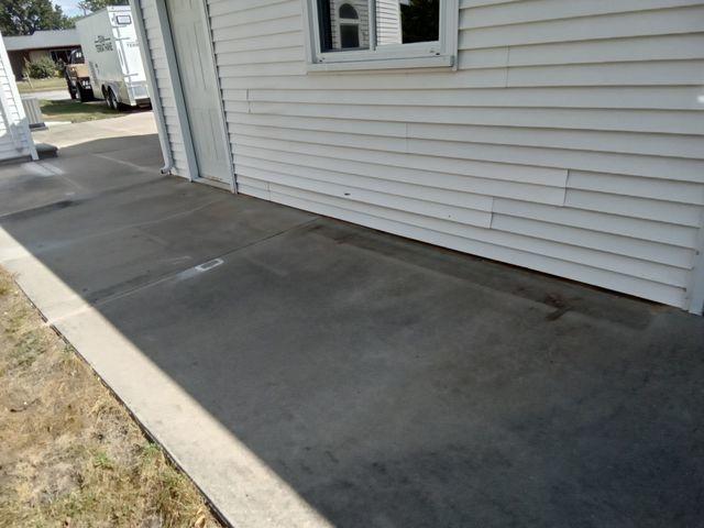 Here is another view of the concreted slabs lifted via PolyLevel injection, more clearly showing where the slabs were sinking in and sloping against each other near the center.