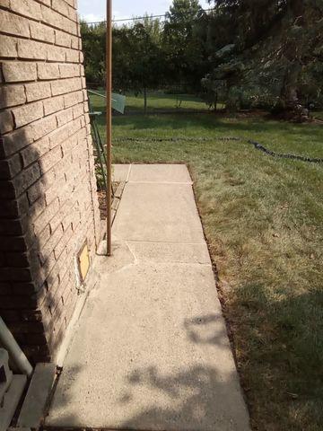 Sidewalk Concrete Slabs Leveled and Sealed