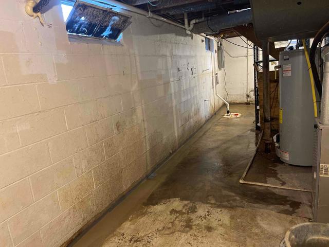 Basement Drainage System and Sump Pump