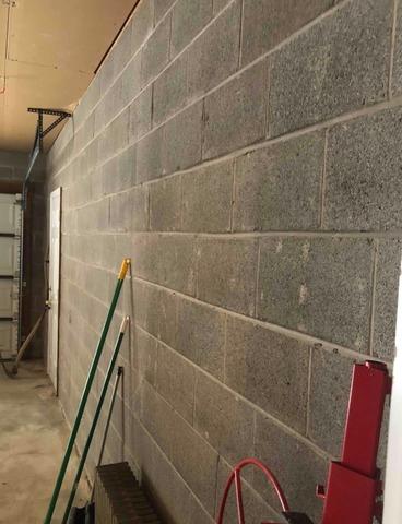 Horizontal cracks were forming across the walls of this basement. The homeowner immediately contacted Quality 1st Basement Systems for an estimate.