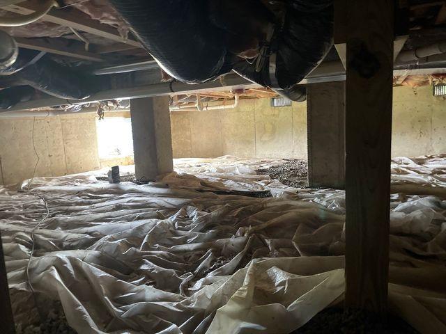 The walls are uninsulated and vented to outside. letting unconditioned air enter the crawl space.  this plastic will trap moisture and create mud and mildew smells.