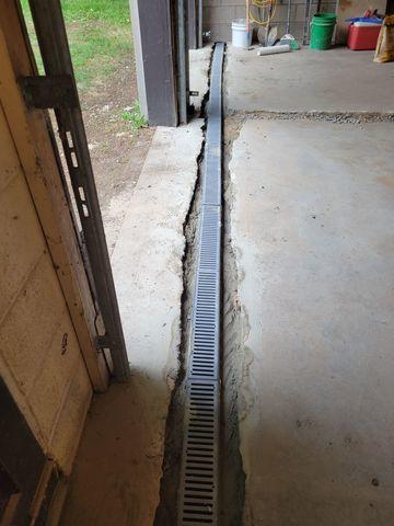 Trainch drain is added at the doorway to be drained tot he sump