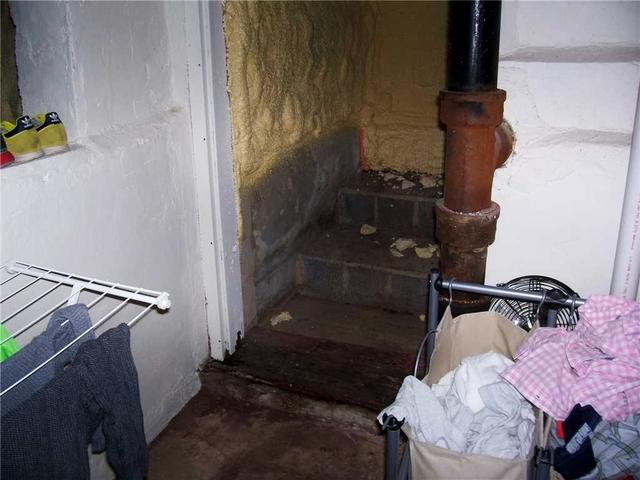 Wet Basement Stairs Due to Water Seepage