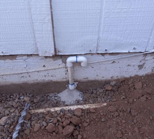 Symptoms of Corrosion Problems in a Stem Wall: Flaking Paint