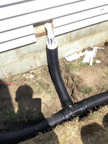 We began our project by installing 106 linear feet of drain tile around perimeter of crawlspace and tied into a SuperSump with a Zoeller M98 sump pump. We discharged that plumbing to the outside through an IceGuard that runs to a 15 foot underground downspout. To combat the heavy areas of mold, we sprayed Mold-X.

To help manage moisture and humidity, we installed a CleanSpace Encapsulation System over exterior walls, across the floor, and around existing pilasters. The encapsulation system was buttoned along the walls, with all seams on the walls and floor overlapped, then sealed with urethane, and secured with industrial tape. 

To help support the structure, we installed a new beam on existing support columns and pocket. We also sistered floor joists with new lumber. 

Finally, we installed an AprilAire E100 and drained that into the SuperSump.