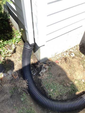 We began our project by installing 106 linear feet of drain tile around perimeter of crawlspace and tied into a SuperSump with a Zoeller M98 sump pump. We discharged that plumbing to the outside through an IceGuard that runs to a 15 foot underground downspout. To combat the heavy areas of mold, we sprayed Mold-X.

To help manage moisture and humidity, we installed a CleanSpace Encapsulation System over exterior walls, across the floor, and around existing pilasters. The encapsulation system was buttoned along the walls, with all seams on the walls and floor overlapped, then sealed with urethane, and secured with industrial tape. 

To help support the structure, we installed a new beam on existing support columns and pocket. We also sistered floor joists with new lumber. 

Finally, we installed an AprilAire E100 and drained that into the SuperSump.