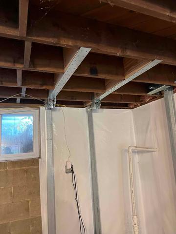 The basement walls in this home were bowing inward allowing water and moisture to seep through.  We installed CleanSpace wall vapor barrier to prevent any moisture from passing through