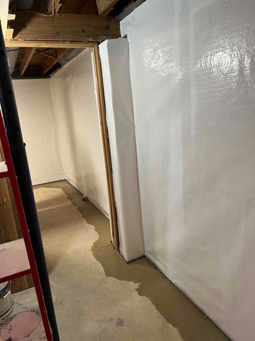 CleanSpace wall vapor barrier and the WaterGuard drainage system were installed to help redirect any leaking water to a TripleSafe sump pump