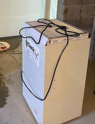 Utilizing A SaniDry Xp Dehumidifier