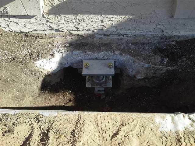 Pier installed to stabilize foundation
