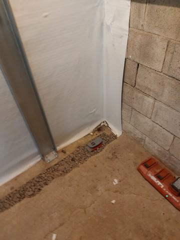 Bolted to footing