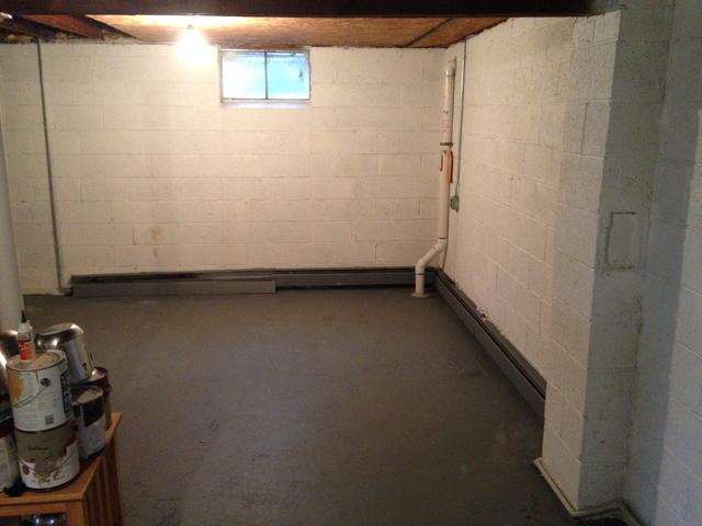 This is a photo of the basement before the waterproofing system was put in place.