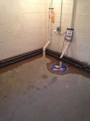 Here you can see an image of the SuperSump installed in this basement. 