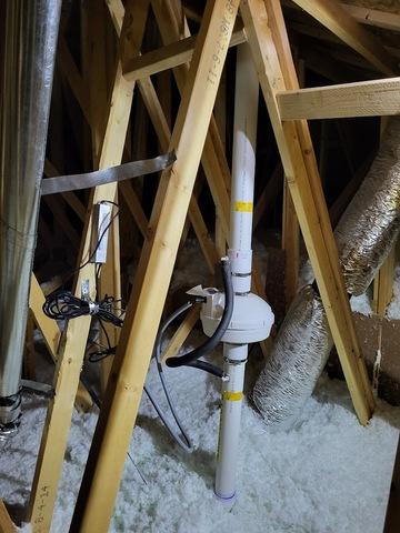 Attic install of radon fan.