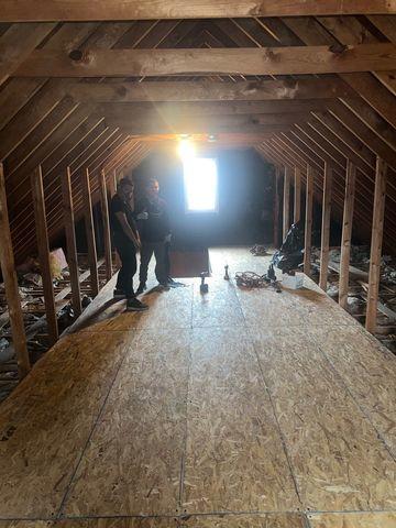 With the floors insulated and covered in plywood, the deck walls would be constructed next and then the space would be filled with Tru Soft Cellulose Insulation