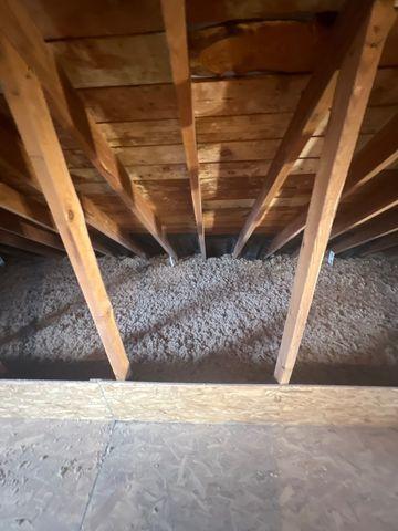 Finished and ready for use, this attic decking and cat walk allow has a clear barrier between the side spaces and the inner area of the attic.