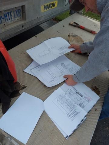 Installer checks drawings