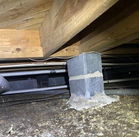 Wet dirt floors and exposed foundation pillars are cold and uninsulated, leading to the cold floors above.