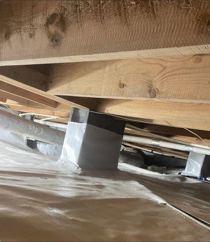 Clean Space is the final layer that covers the flooring, walls and pillars of the foundation.  This waterproofing cover helps make the crawl space dry and useable for storage if needed.