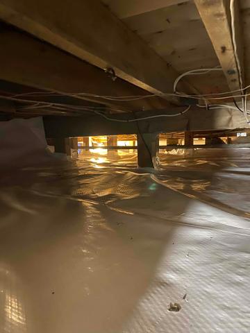 To cover up all the dirt, we encapsulated the crawlspace with CleanSpace vapor barrier to prevent moisture and pests from creeping in!