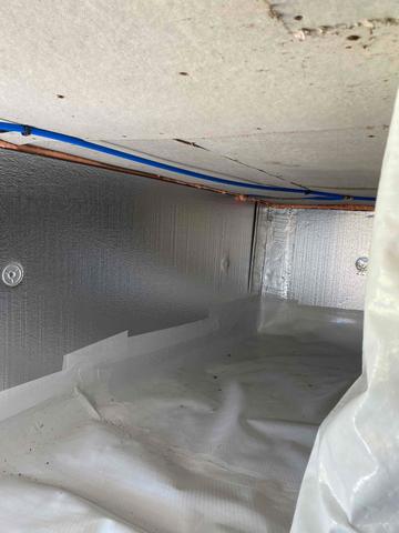 To heat up the crawlspace, we installed SilverGlo crawlspace wall insulation to reflect heat back into the cold area!