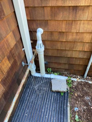 This IceGuard is installed to the discharge line outside to ensure water escapes the basement and crawlspace during freezing times.