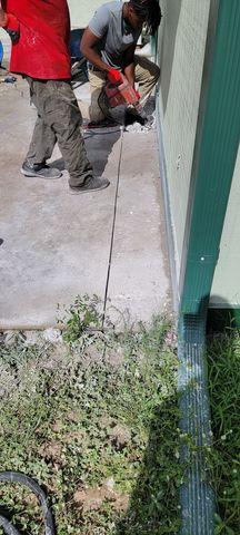 LRE's Crew Members Begin Work on Channel Drain Installation