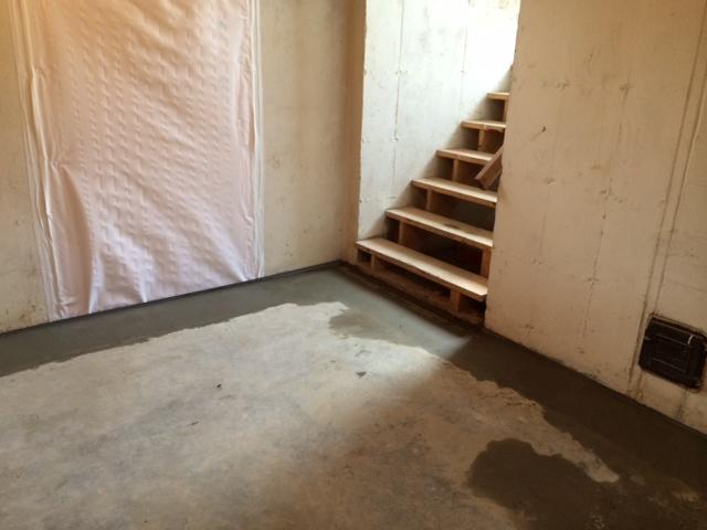 Here is a photo of the basement after the waterproofing system was installed. We promise to keep their basement dry so they can use it for storage!