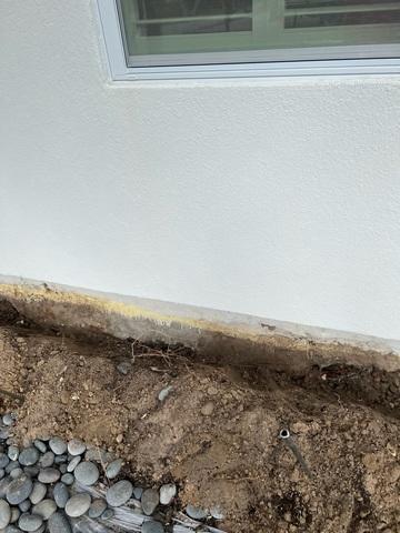 Exposed Foundation Due to Voids Under Home