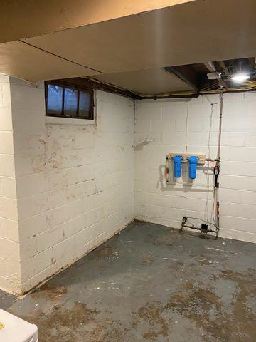 These walls were letting water seep through the cracks, cause some mold and mildew to form. This can cause a musty smell in your home. Mold and mildew are not healthy for you or your home. Adding a vapor barrier can help prevent mold, as well as keeping energy bills down.