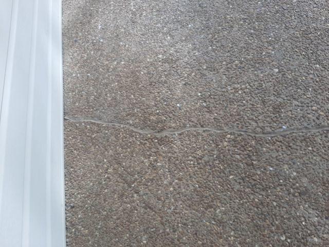 After Photo of settling and cracking