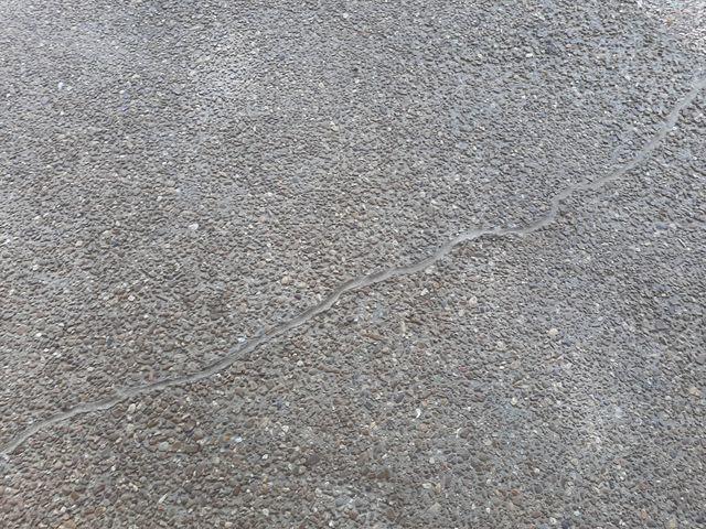 After Photo of settling and cracking