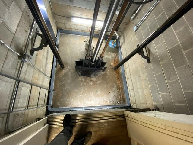 DryTrak perimeter drainage and a sump pump were use to keep the elevator shaft dry all the time from now on.