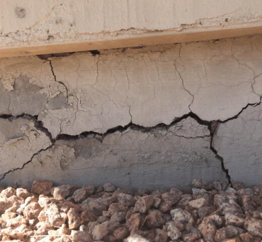 Stem Wall Failure Symptoms: Spalling Concrete