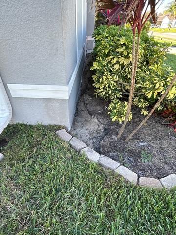 Erosion started to take place around the house and water was intruding from the plant bed area. If this is not addressed, soils could potentially become looser and looser causing voids under the home and movement to the foundation. Excess movement could lead to cracks, moisture intrusion, and other issues.