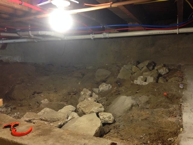 Here you can see the dirt floor in the crawl space.