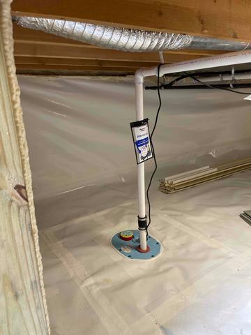 In a room where we fully encapsulated the area with CleanSpace vapor barrier to keep moisture out, we also installed a SuperSump to discharge any excess water!