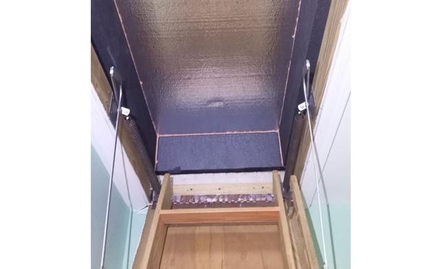 When we open the pull down stairs we can see our David Lewis Hatch Cover in place.  After air sealed and weather strip is framed out, the David Lewis Hatch Cover is ready to be installed.  This is a finished image.