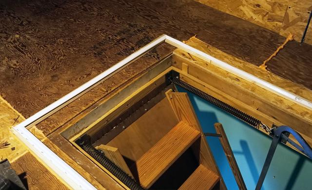 We are ready to fasten our David Lewis Hatch Cover on top of the pull down stairs.  The attic hatch has weather stripping and also is air sealed.