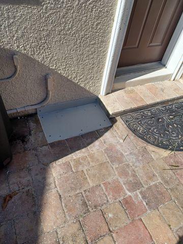 Sealing off unnecessary access points to the crawlspace area helps prevent future damage from water intrusion. In this case, it also left the paver walkway clean and hazard-free.