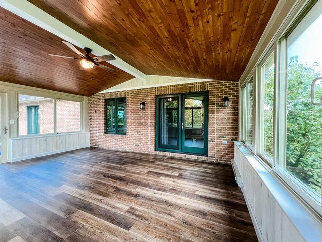 Along with LVP flooring is a nice wood plank ceiling system, finished nicely making the ceiling pop matching the earthy colors of the house and sunroom.