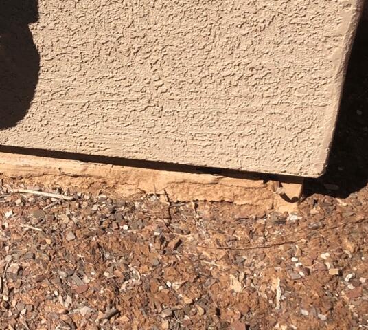 Symptoms of Corrosion Problems in a Stem Wall: Flaking Paint
