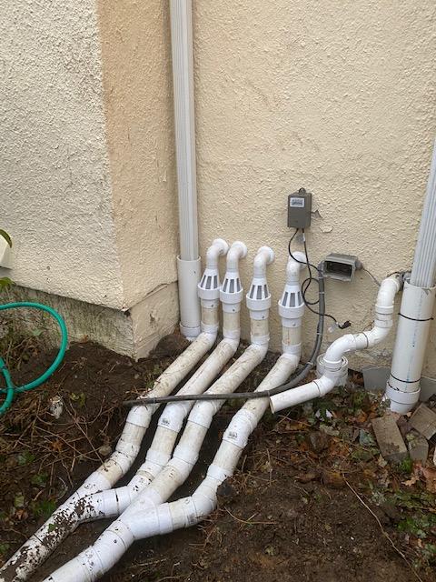 Right outside where the discharge line starts, our production team installed IceGuards to allow water to leave the pipe incase the line freezes during cold temperatures.