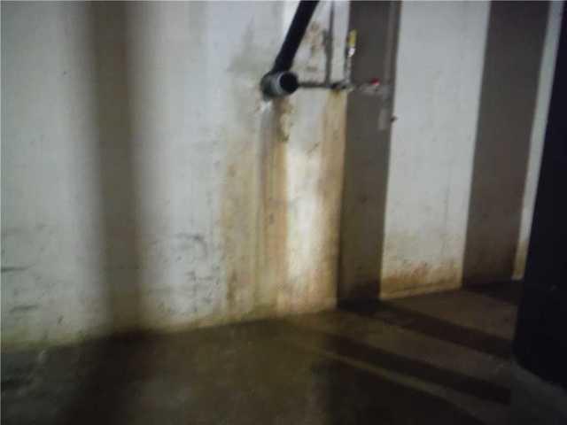 Water leaking through basement wall