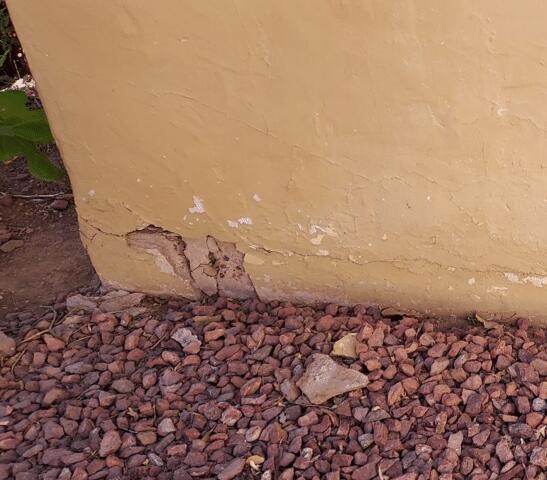 Symptoms of Oxidation Problems in a Stem Wall: Spalling Concrete
