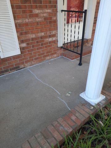 Cracked concrete porch