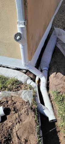 Drainage System Attaches to Downspouts