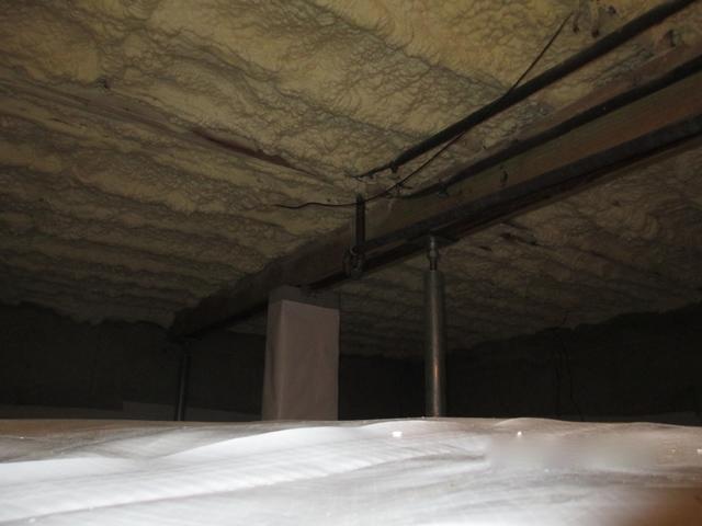 The crawlspace opened up to a larger section, in this section the homeowner wanted a vapor barrier and spray foam.
