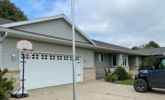 This is the open-style gutter on the front of the home before Gutter Shutter.