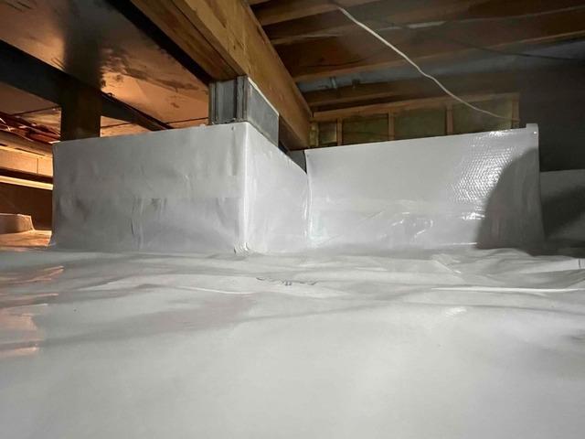 CleanSpace vapor barrier was installed to seal the crawl space ground and walls from moisture seeping through